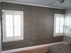 Grasscloth accent wall.